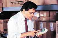 warehouse worker with handheld computer